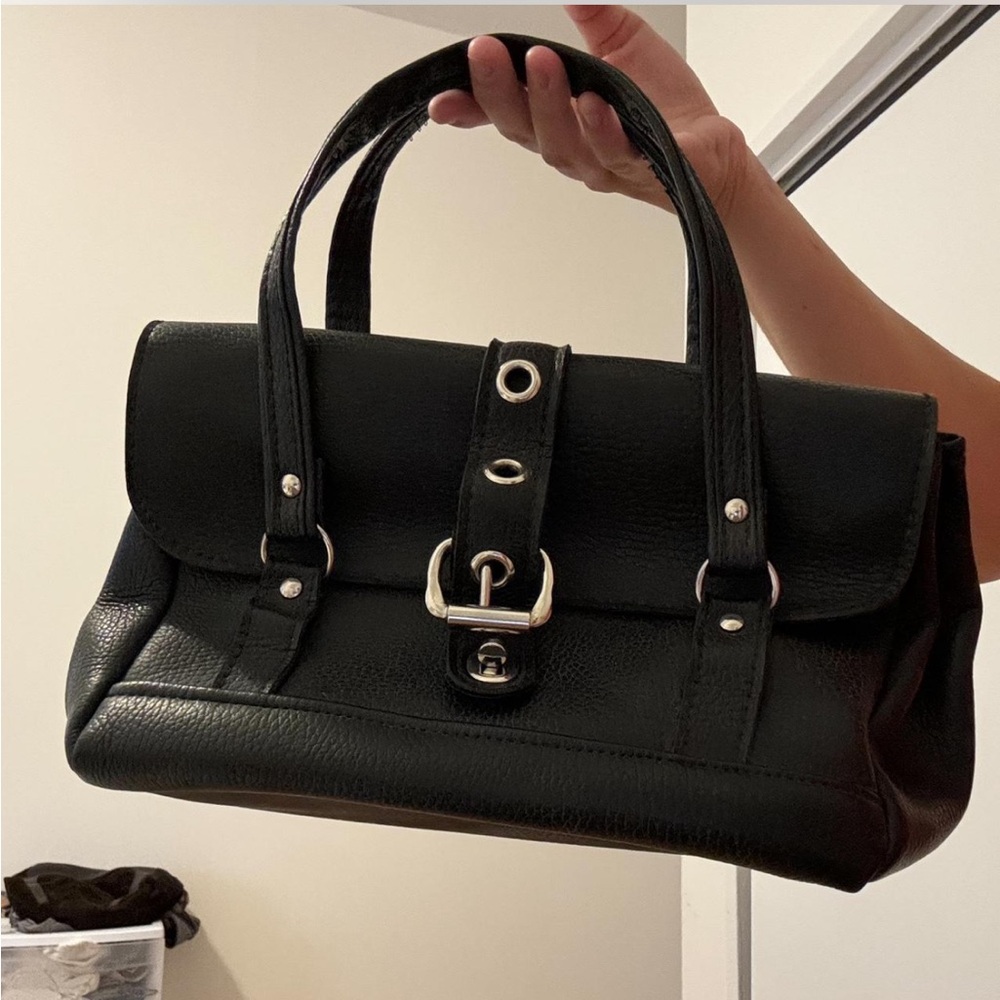 Y2K black shoulder bag with silver buckle and hardware details